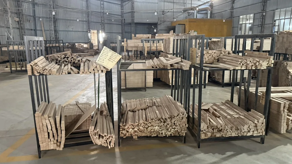 Wood strips sorted on metal carts