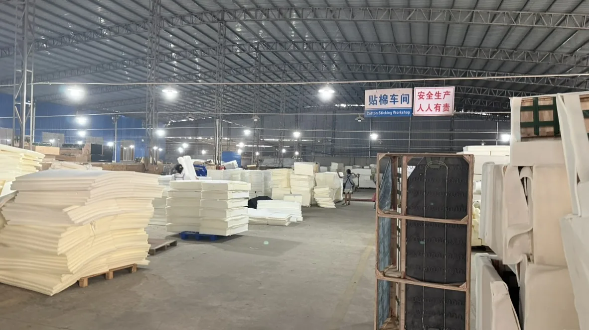 Foam sheets and an aisle in the foam-covering workshop