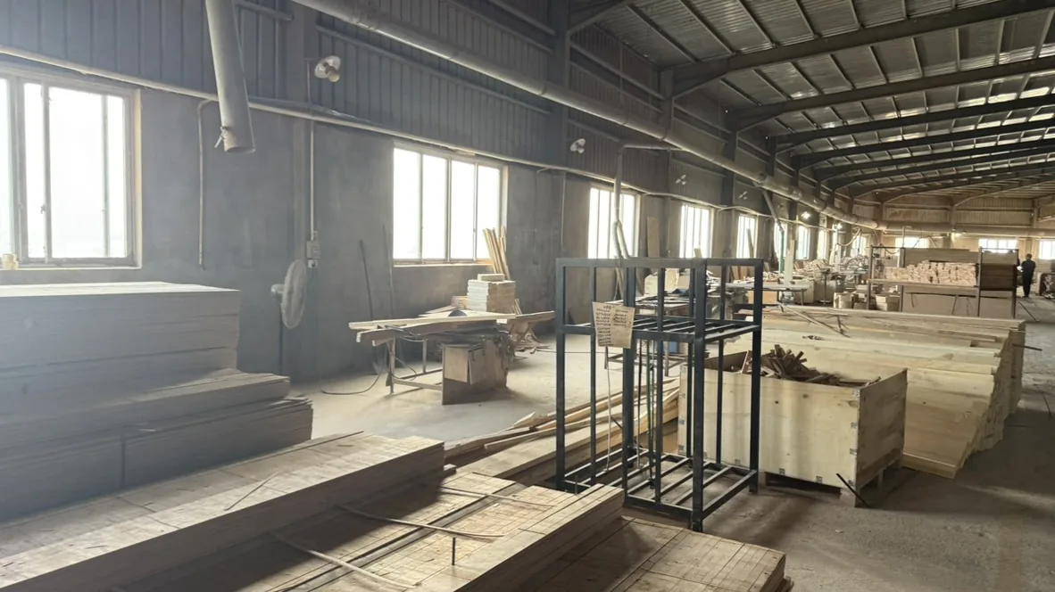 Woodworking area and a long aisle beside windows