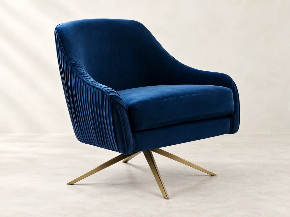 Blue fluted upholstered lounge chair with a splayed metallic base